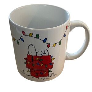 Peanuts Mug with snoopy & Festive String Lights.